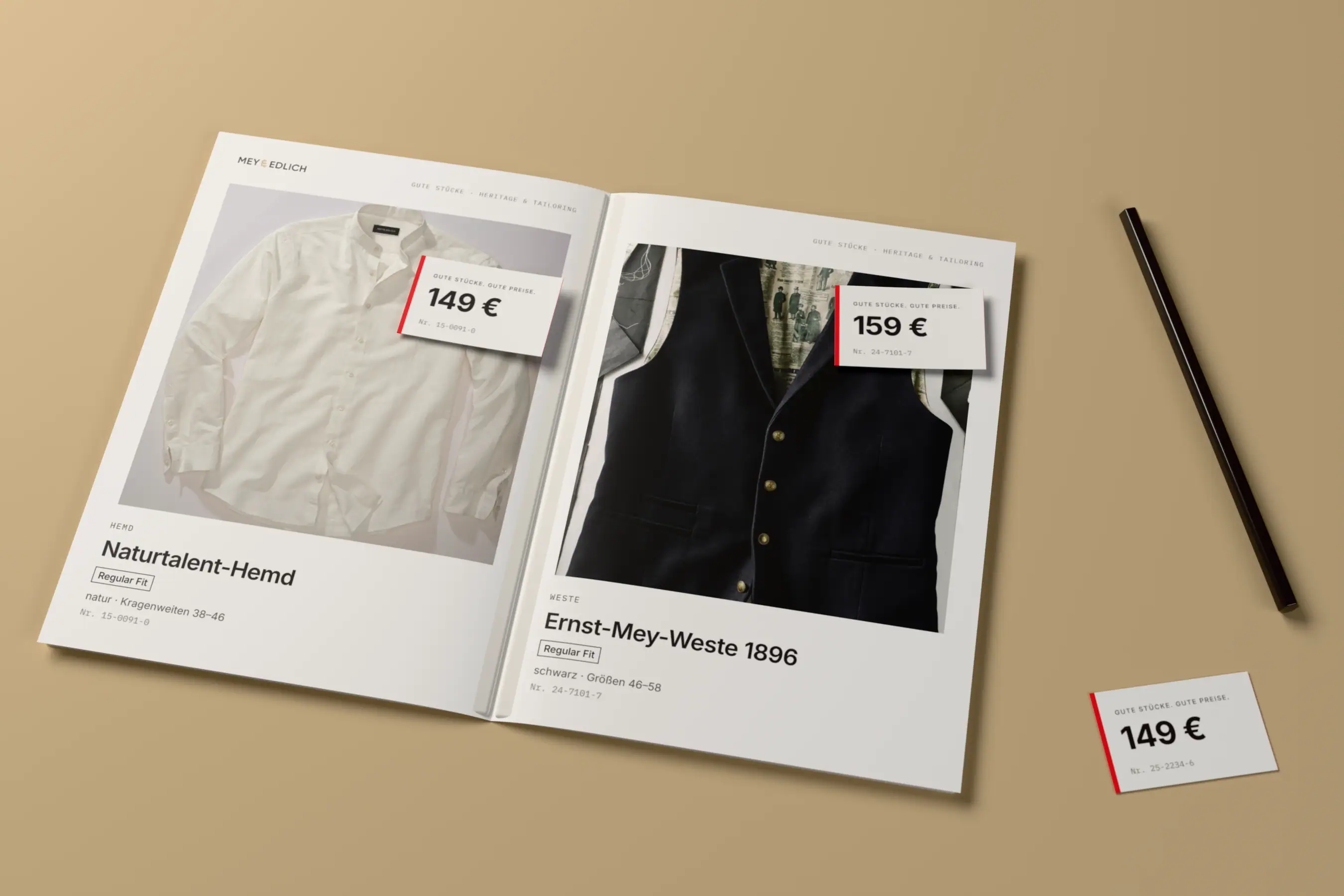 An open catalogue on a sand table with paper price tabs on the shirt and waistcoat photographs