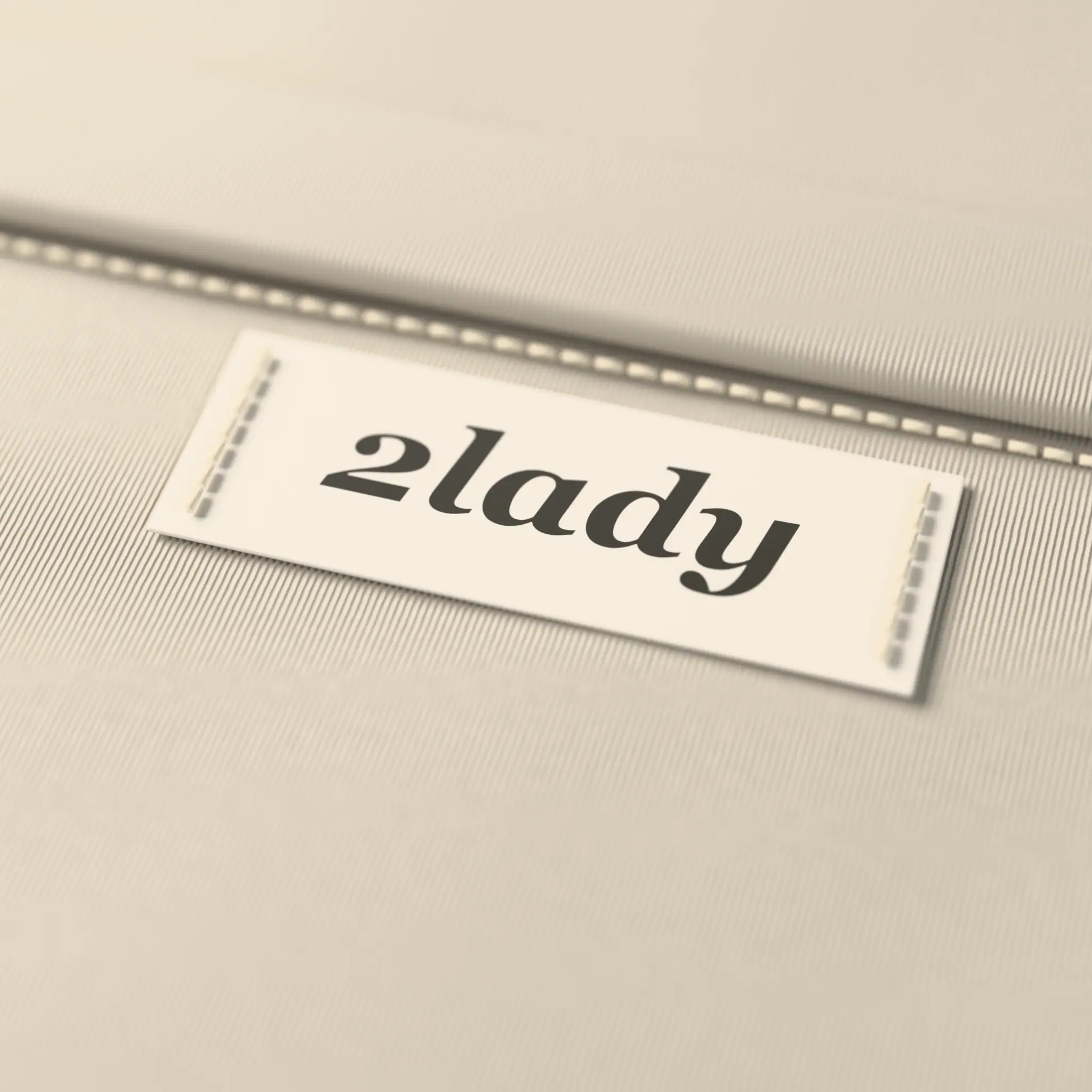 Woven 2lady neck label stitched under a rib collar