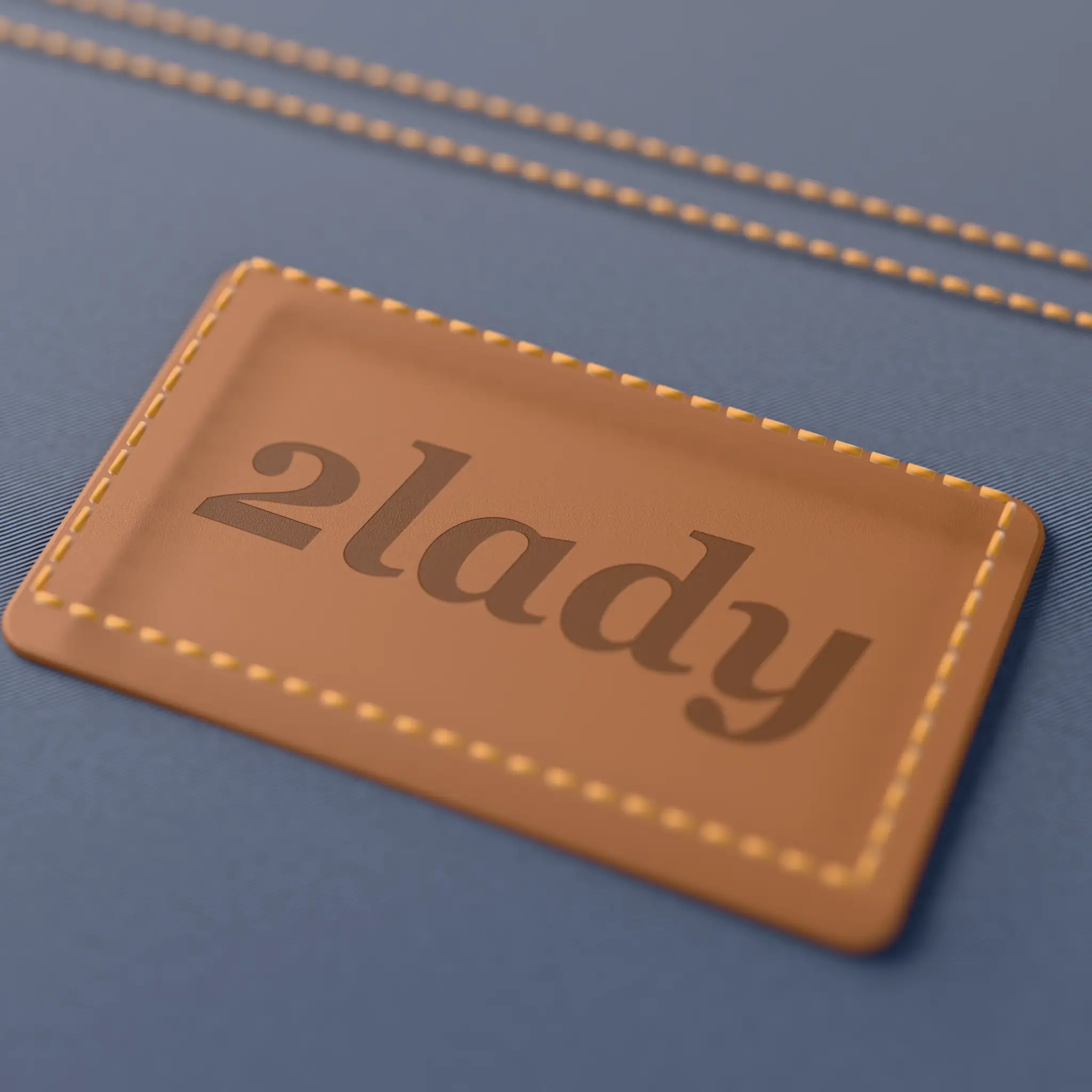 Leather patch debossed with the 2lady wordmark on denim